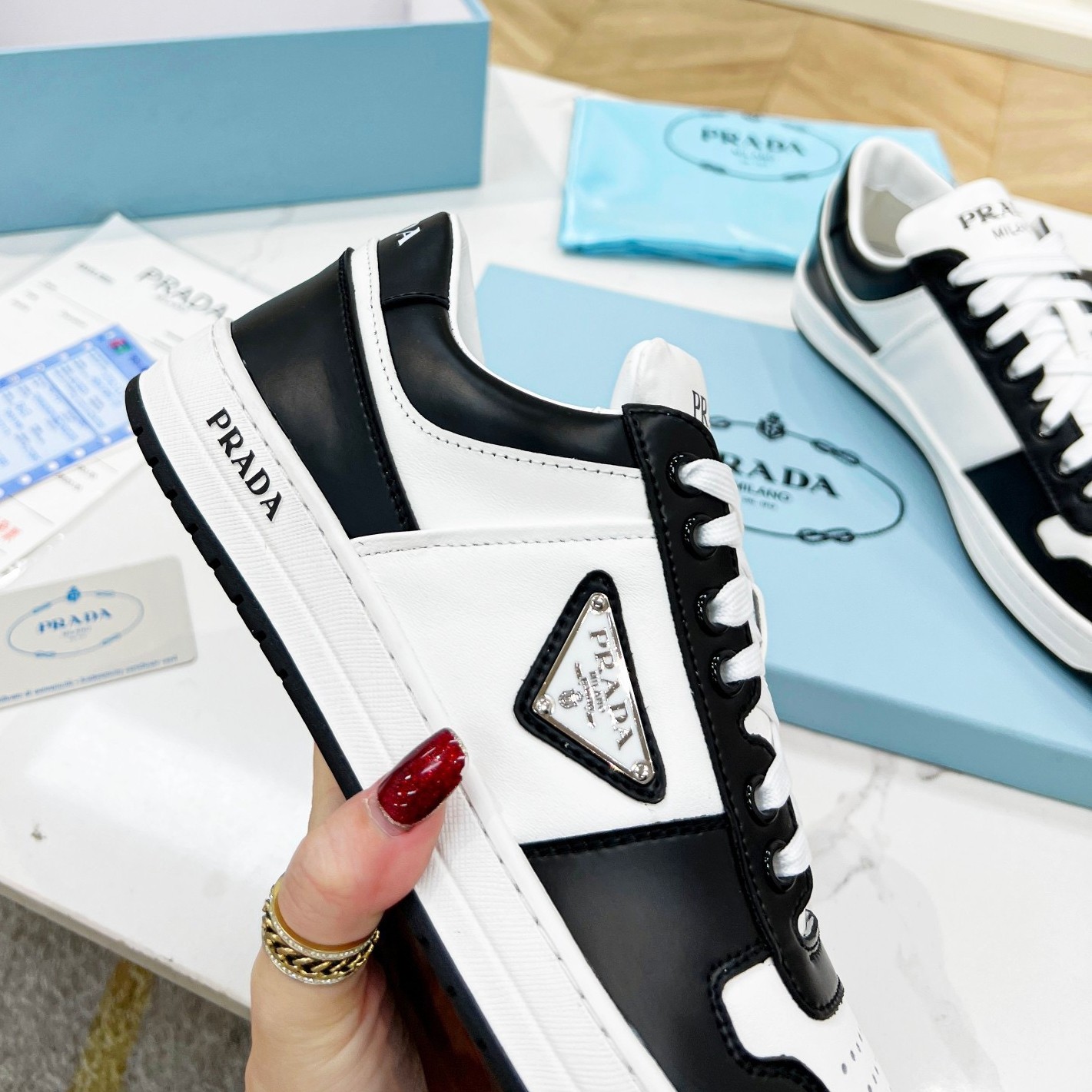 Pra*a downtown sneakers in white and black calfskin