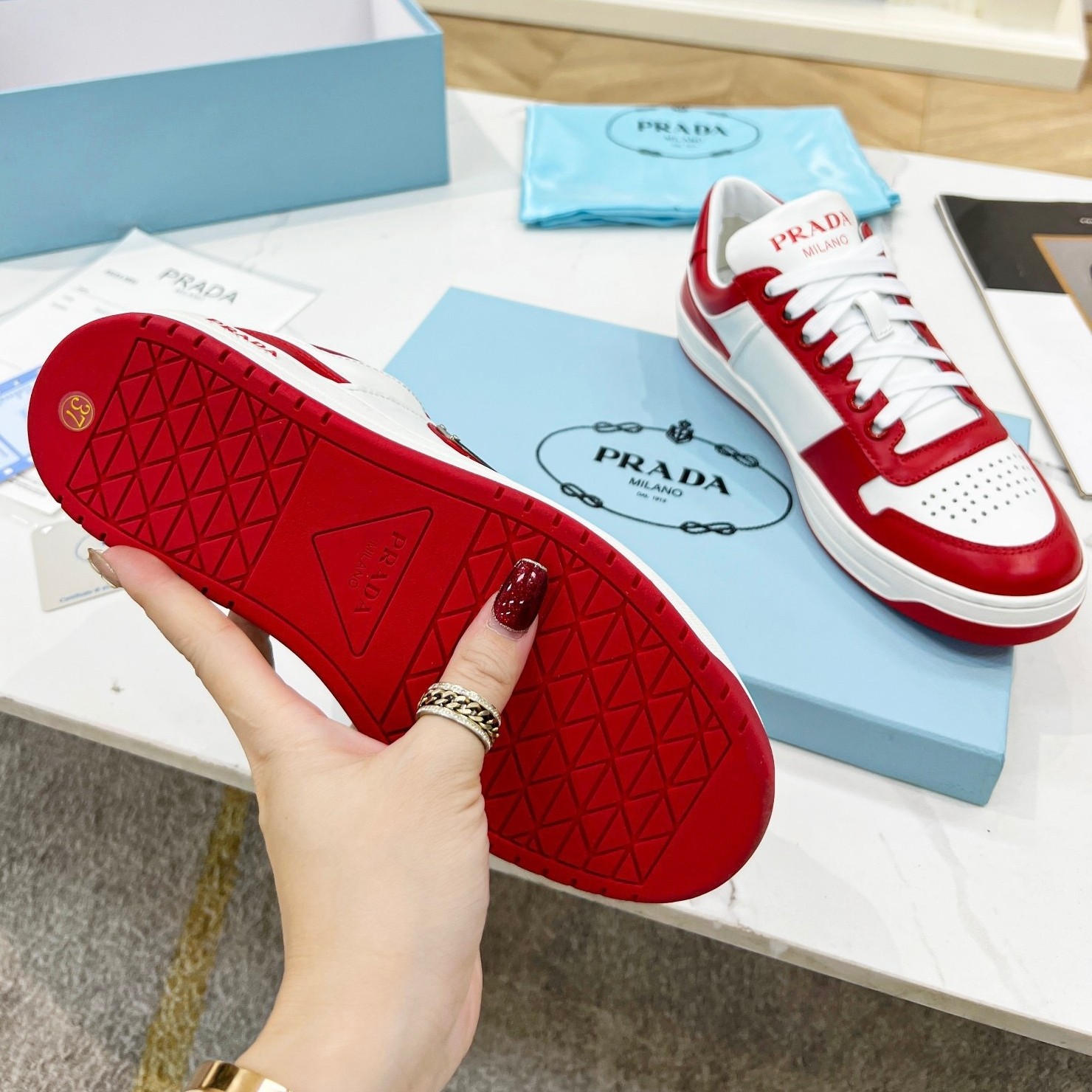 Pra*a downtown sneakers in white and red calfskin