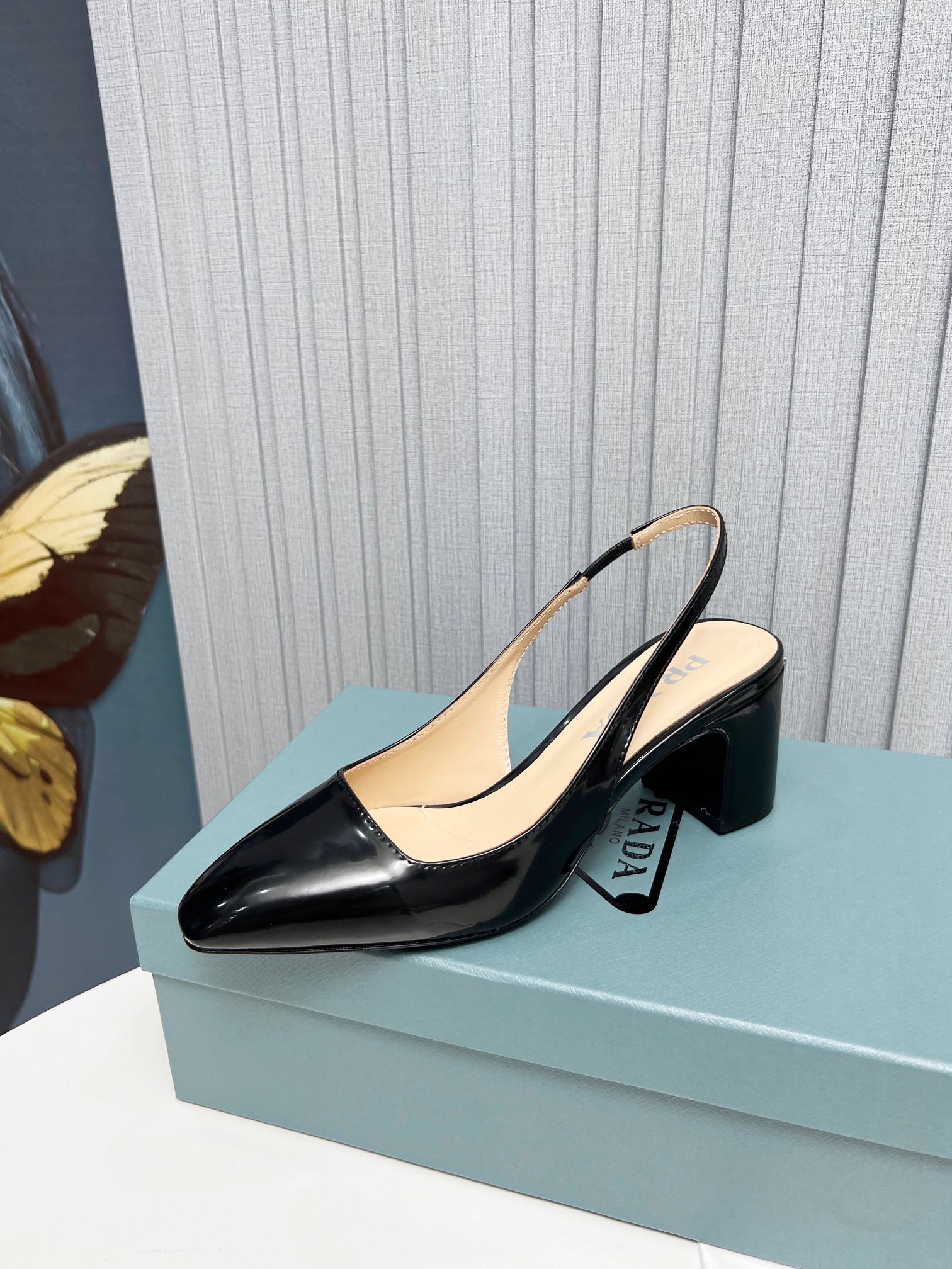 Pra*a slingbacks pumps 65mm in black patent leather