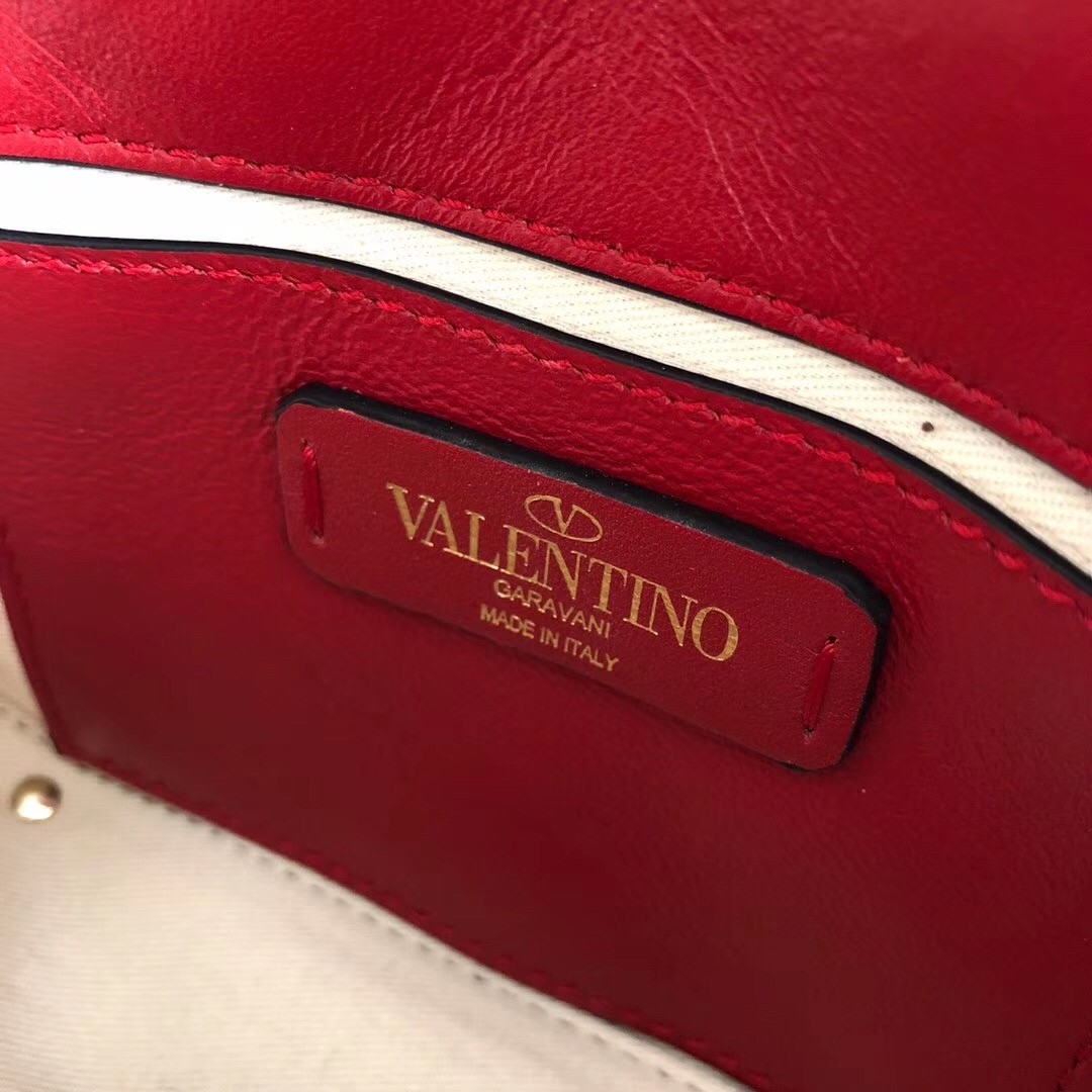 Va1e*ntin0 mini candystud crossbody bag in red lambskin