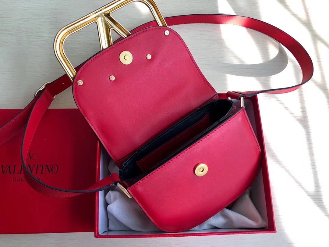 Va1e*ntin0 small s*pervee crossbody bag in red leather