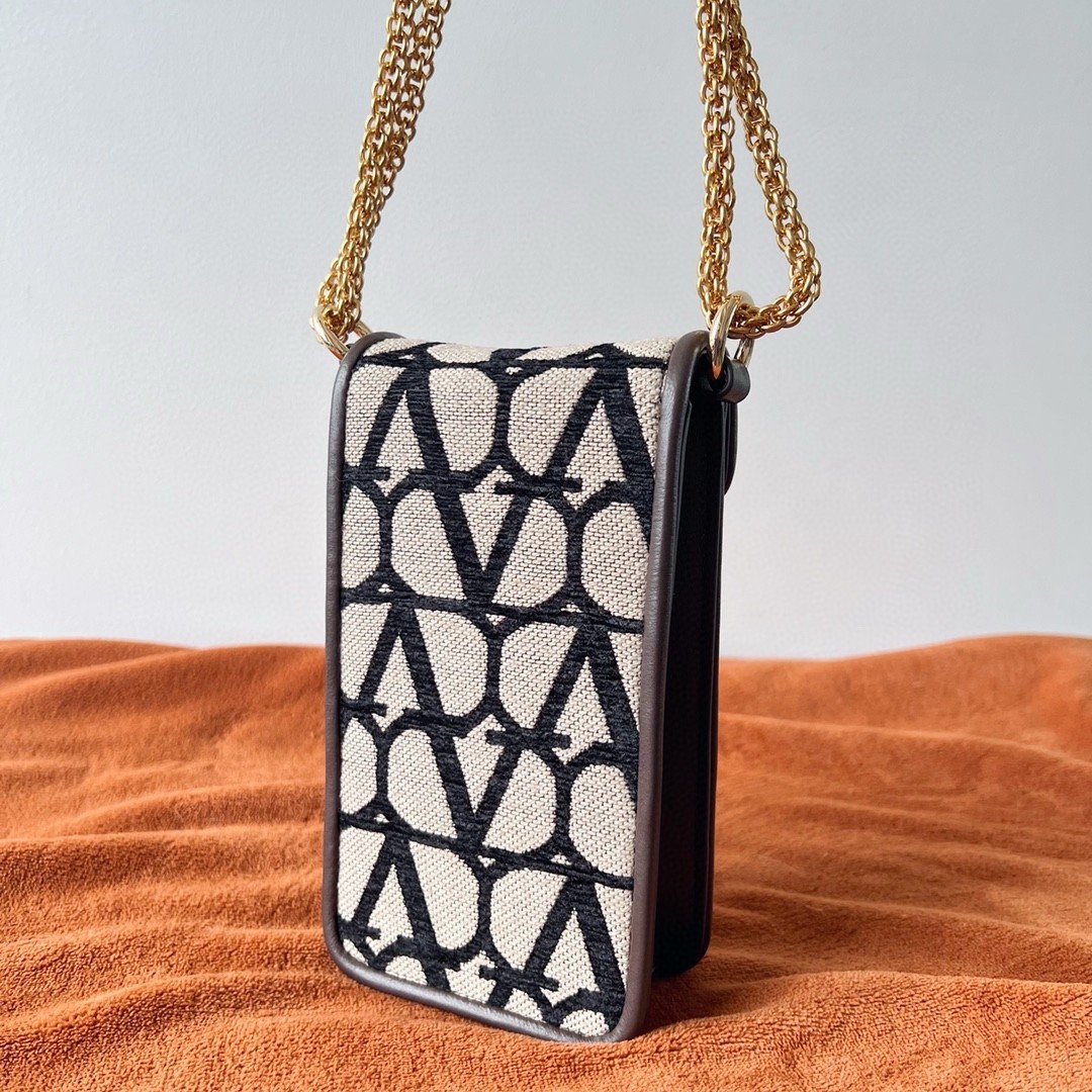 Va1e*ntin0 loco phone case in black toile iconographe with chain