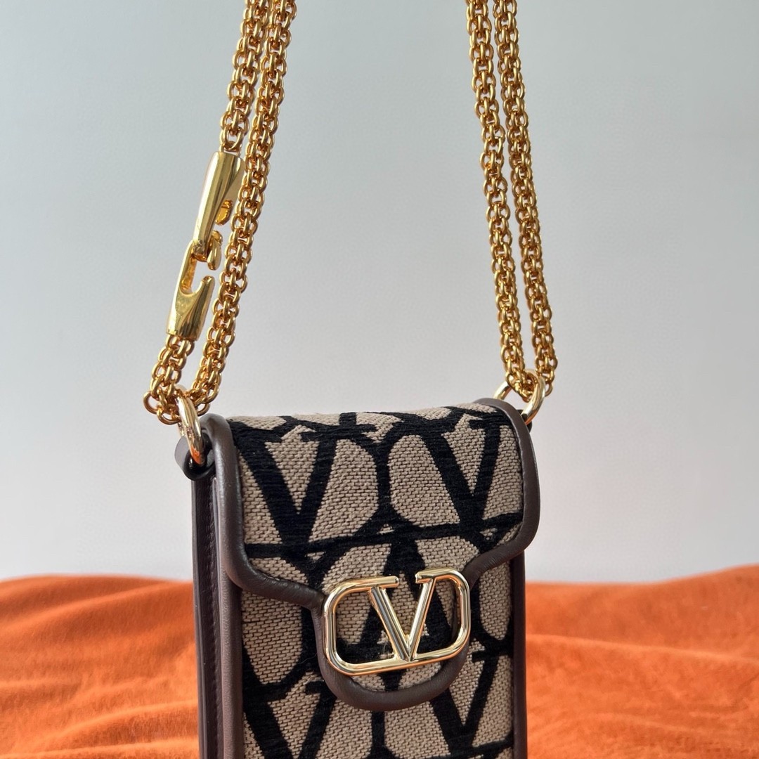 Va1e*ntin0 loco phone case in black toile iconographe with chain