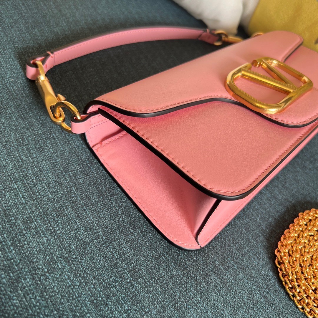 Va1e*ntin0 loco large shoulder bag in pink calfskin