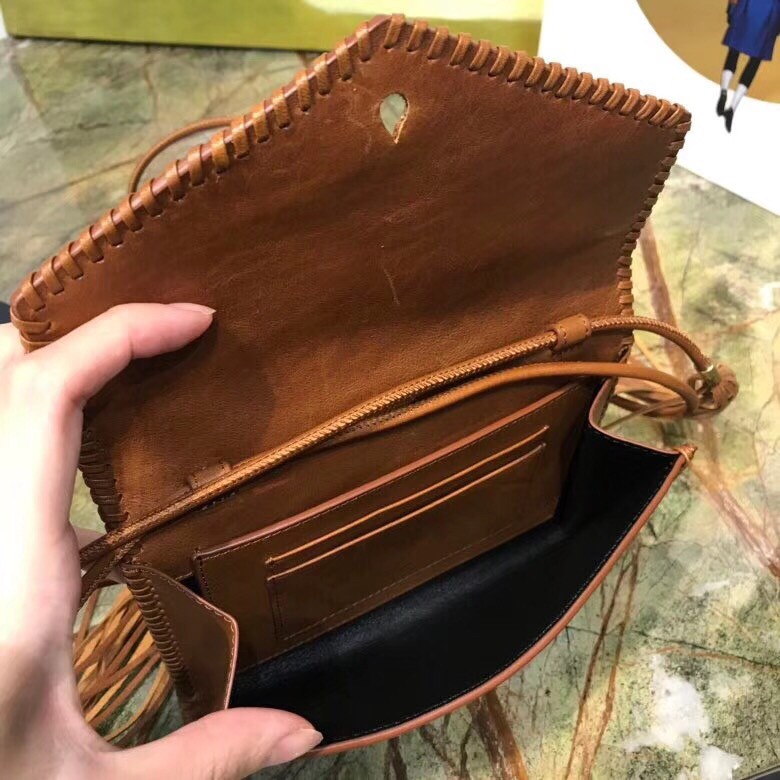 Sa**t Lau*nt brown envelope belt bag