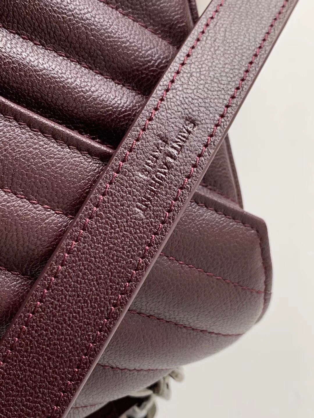 Sa**t Lau*nt college medium bag in burgundy matelasse leather