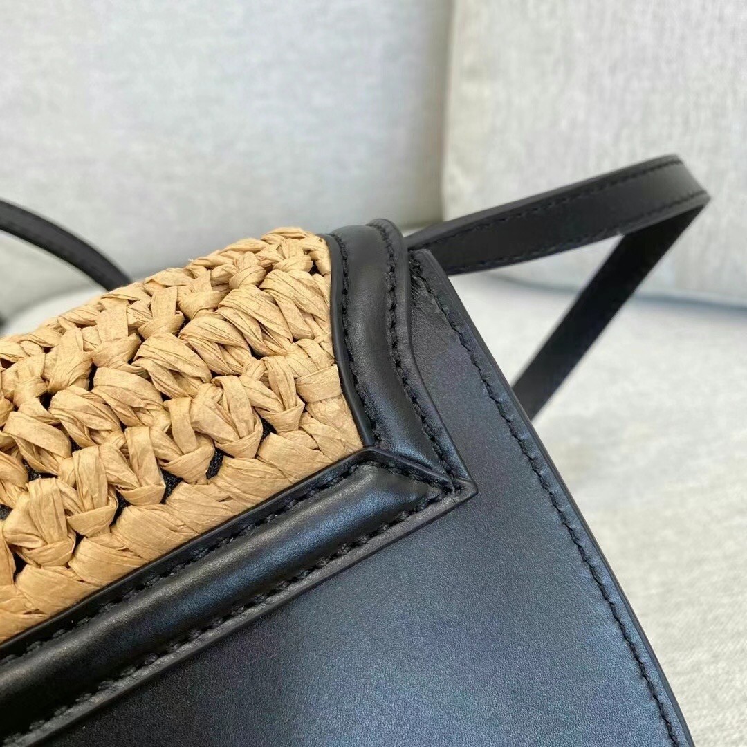 Sa**t Lau*nt kaia small bag in raffia and leather