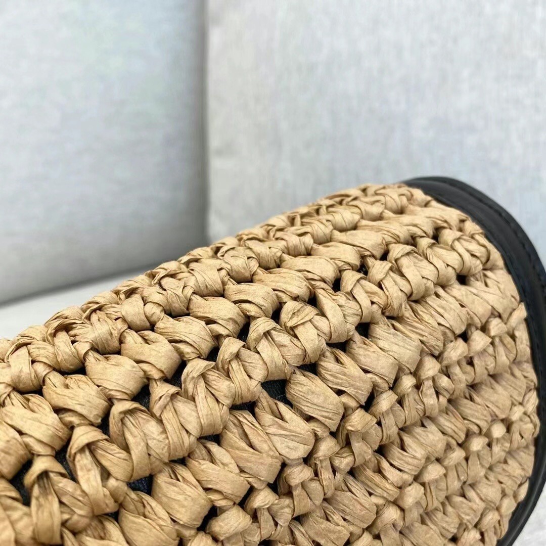Sa**t Lau*nt kaia small bag in raffia and leather