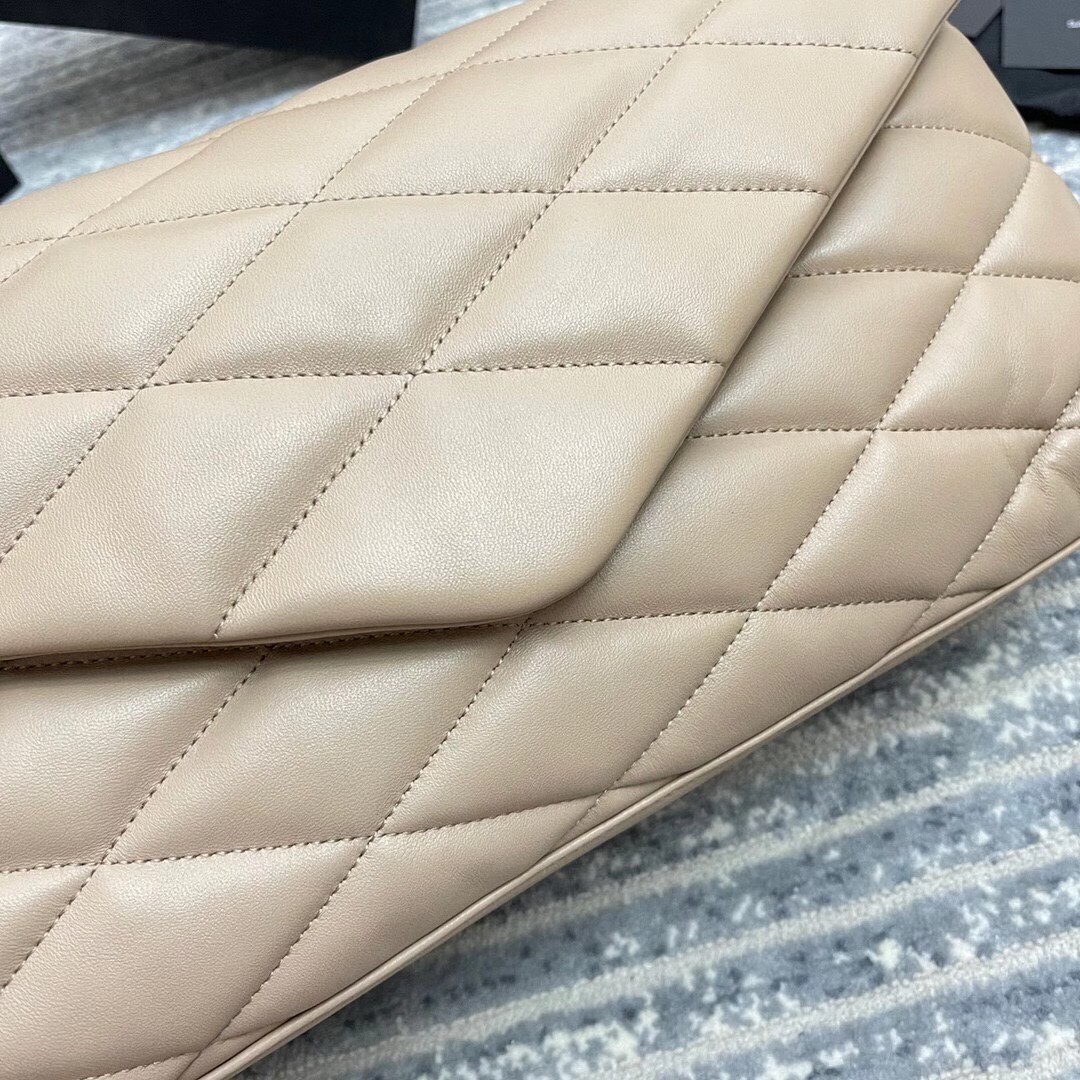 Sa**t Lau*nt sade puffer envelope clutch in beige lambskin