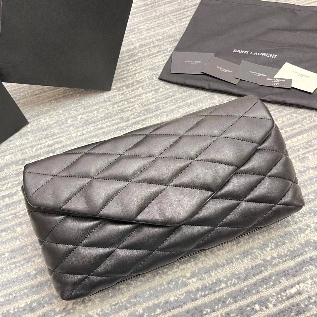 Sa**t Lau*nt sade puffer envelope clutch in black lambskin