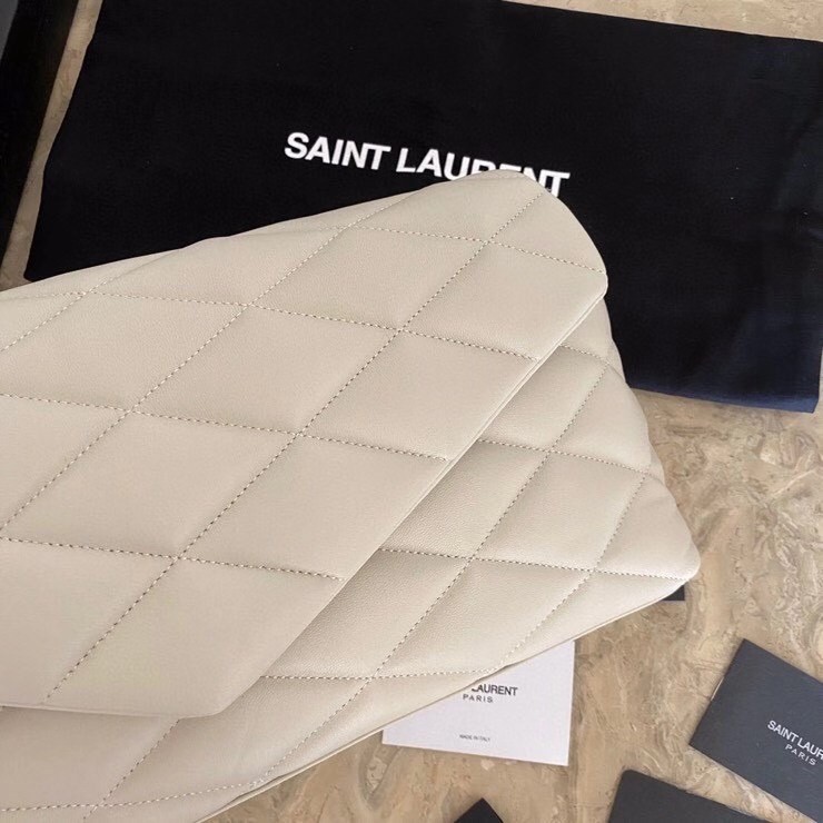 Sa**t Lau*nt sade puffer envelope clutch in white lambskin