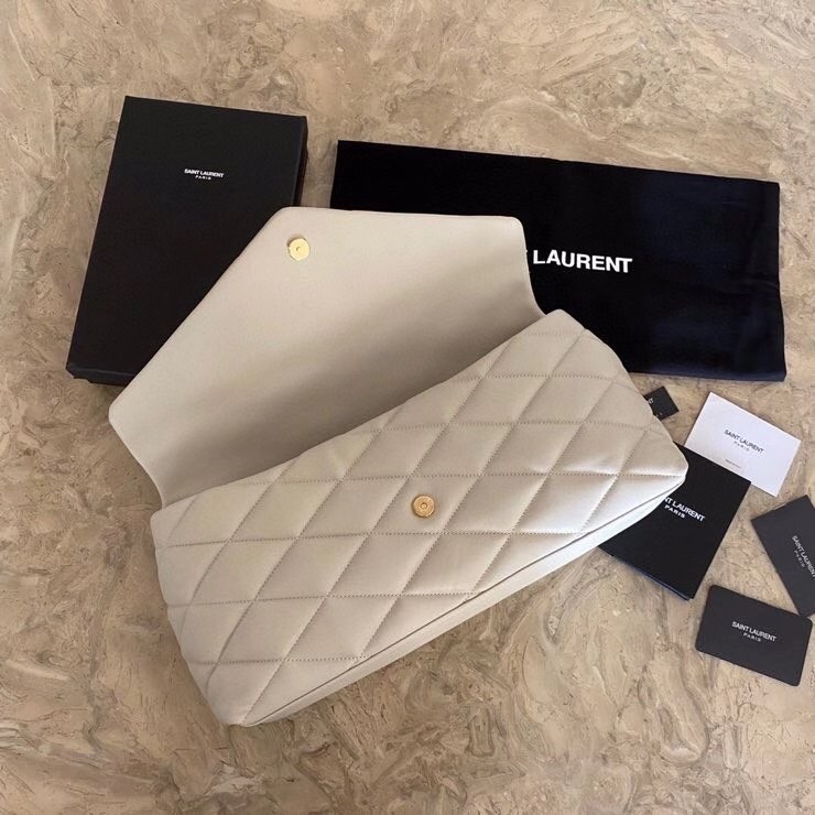 Sa**t Lau*nt sade puffer envelope clutch in white lambskin