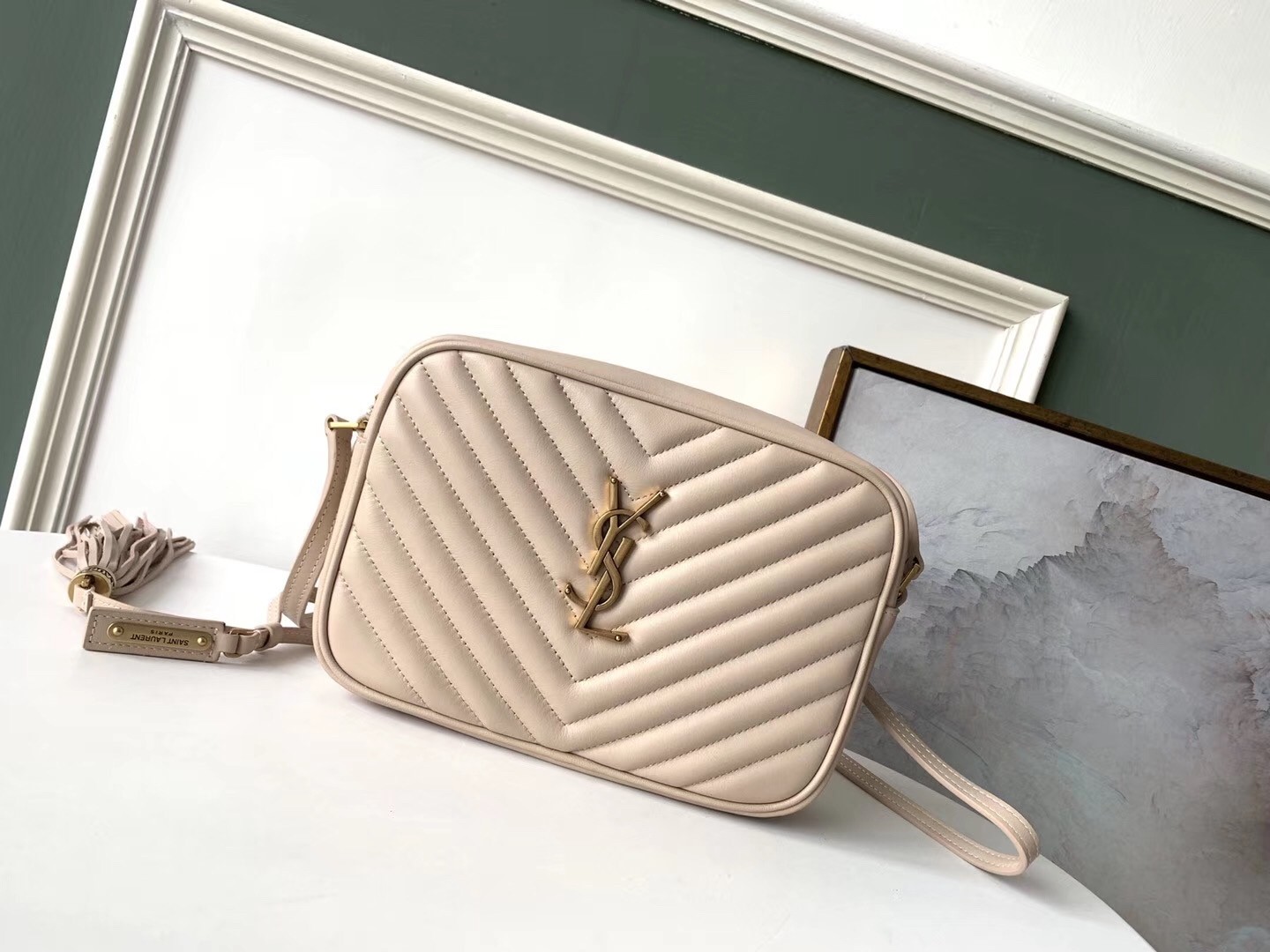 Sa**t Lau*nt lou camera bag in light pink leather