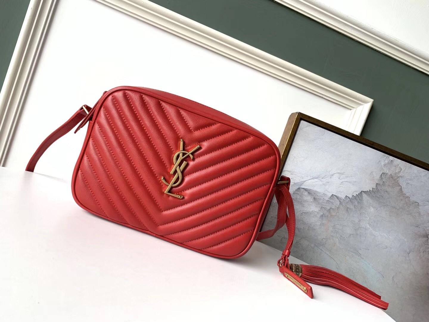 Sa**t Lau*nt lou camera bag in red leather