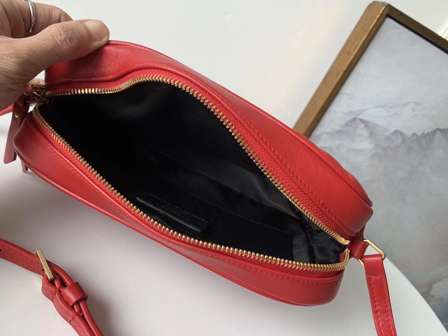 Sa**t Lau*nt lou camera bag in red leather