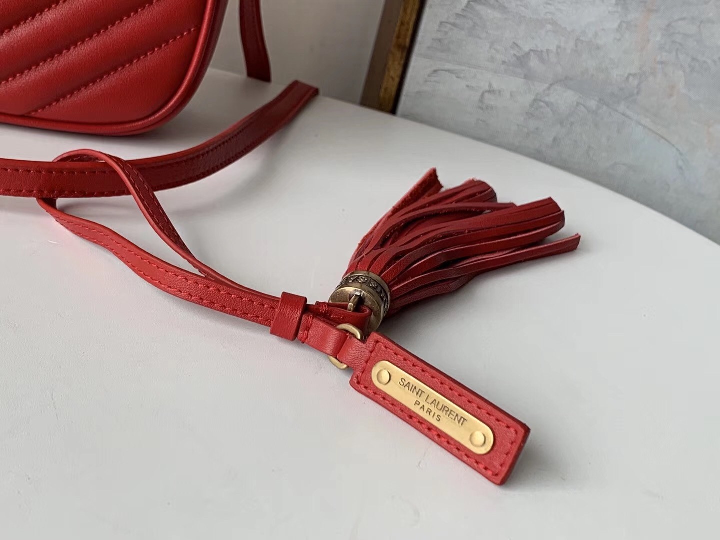 Sa**t Lau*nt lou camera bag in red leather