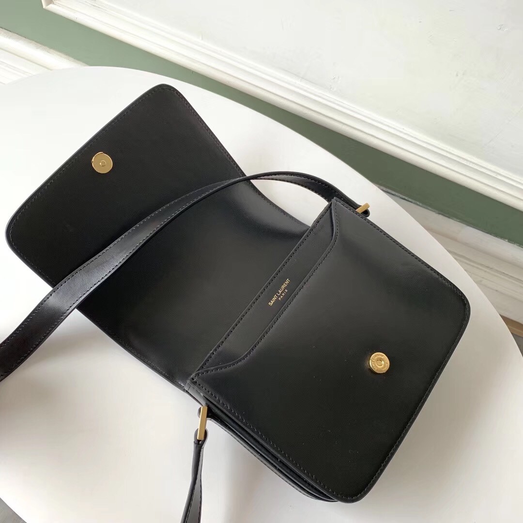 Sa**t Lau*nt le 61 small saddle bag in black leather
