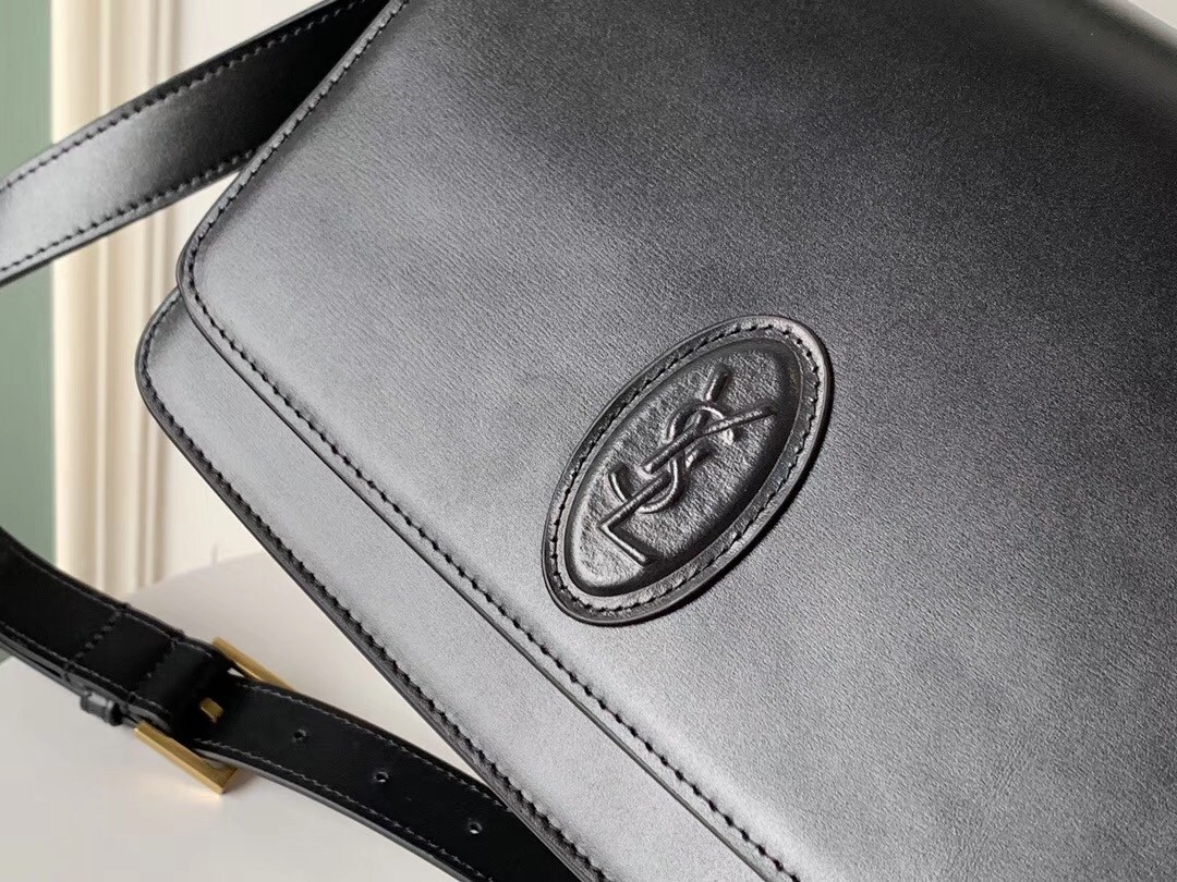 Sa**t Lau*nt le 61 medium saddle bag in black leather
