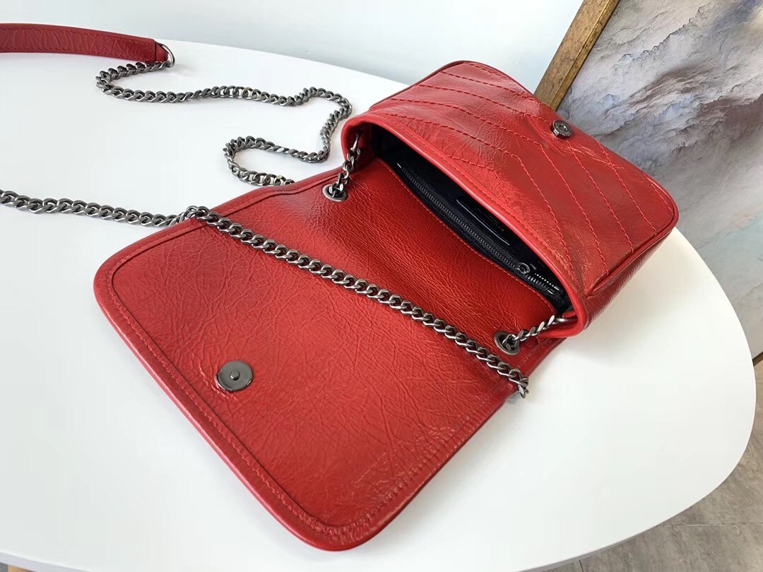 Sa**t Lau*nt woc niki chain wallet in red crinkled leather