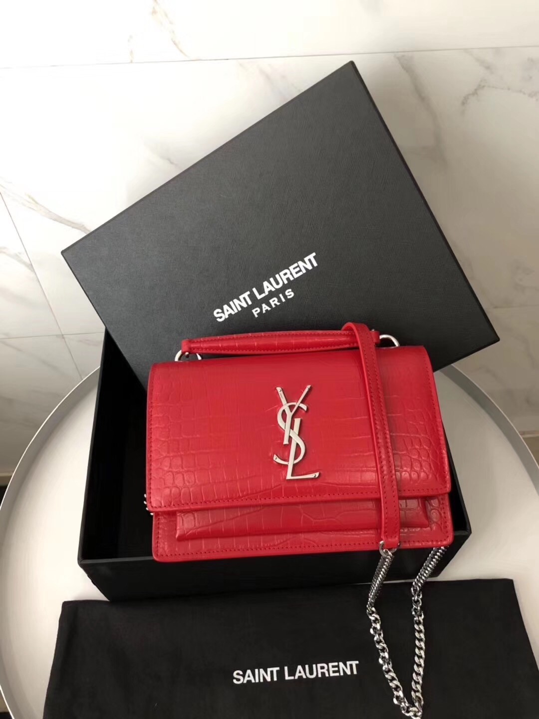 Sa**t Lau*nt woc sunset chain wallet in red croc-embossed leather