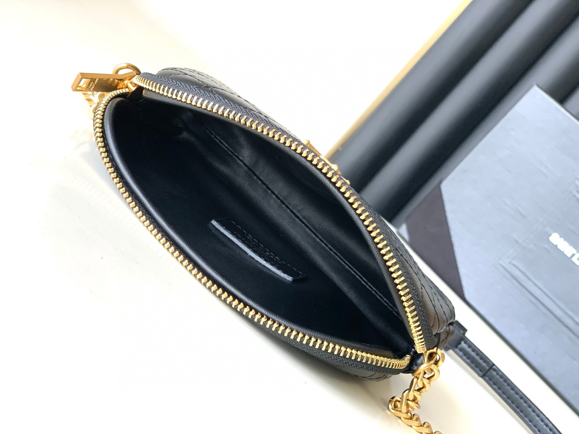 Sa**t Lau*nt gaby zipped pouch in black quilted lambskin