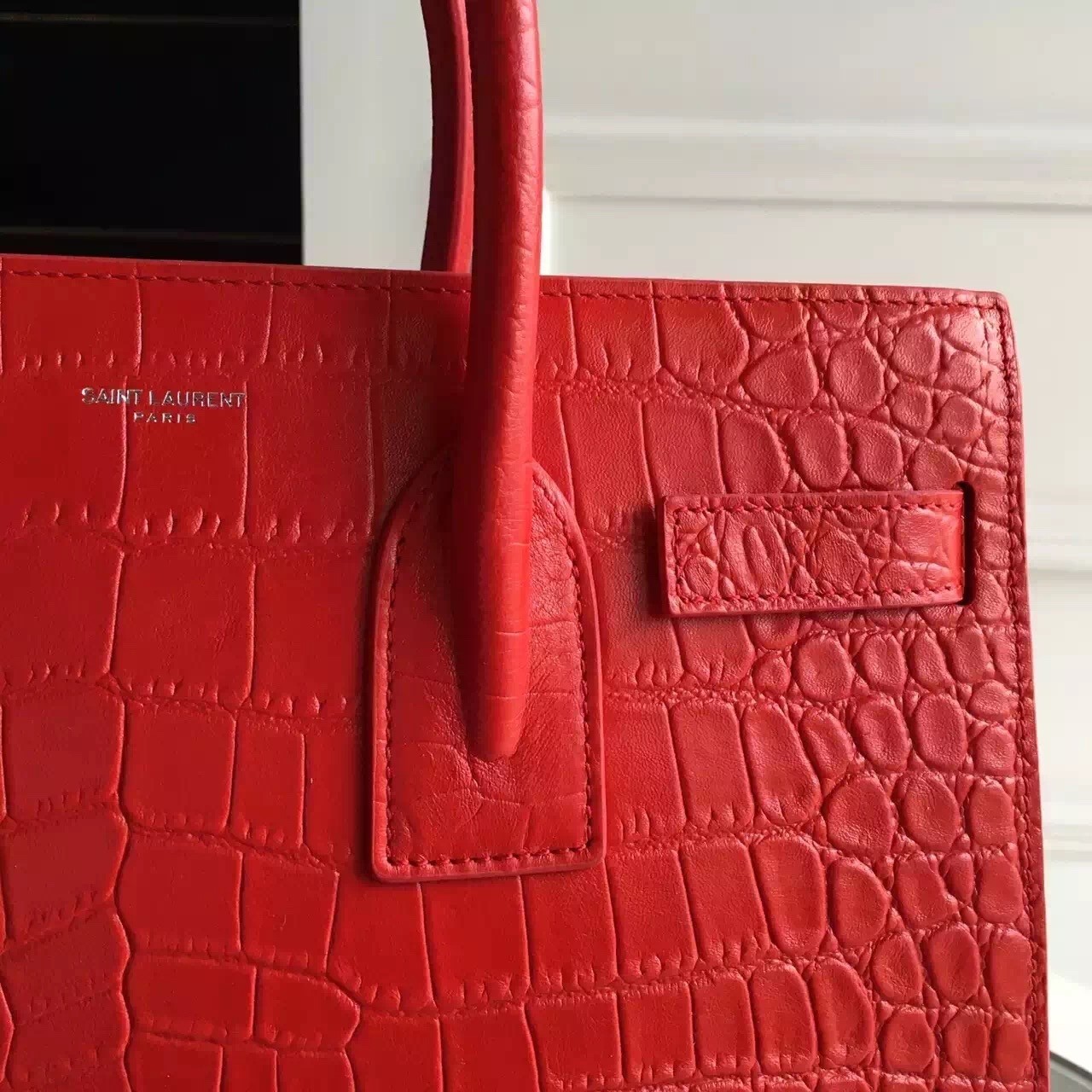 Sa**t Lau*nt small sac de jour bag in red crocodile leather