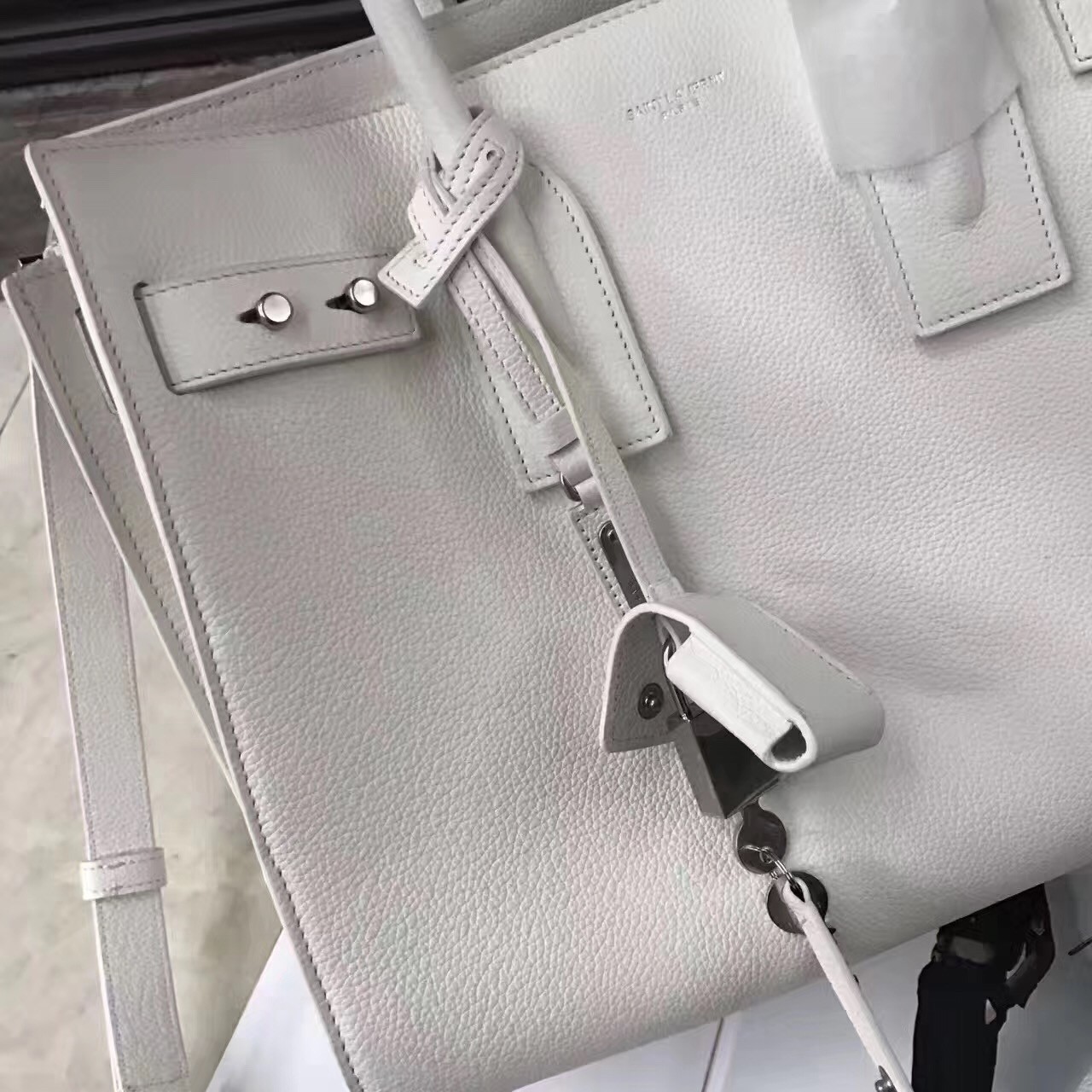 Sa**t Lau*nt small sac de jour souple bag in white grained leather