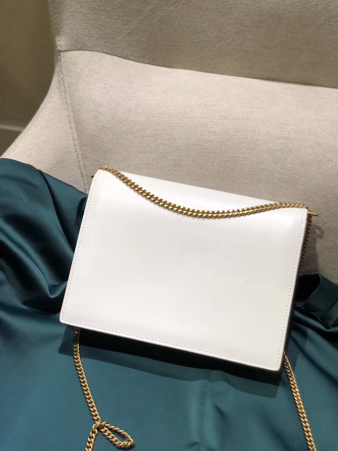 Sa**t Lau*nt blanc cassandra monogram clasp bag
