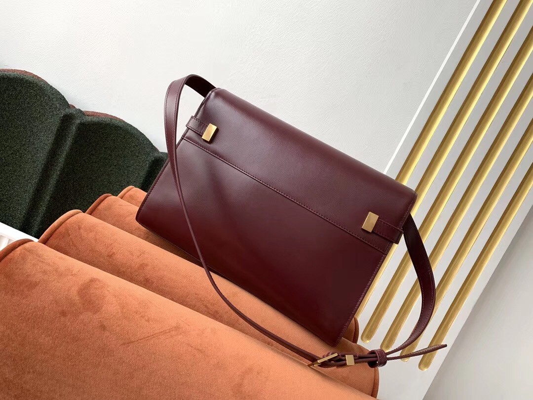 Sa**t Lau*nt manhattan baguette bag in bordeaux calfskin