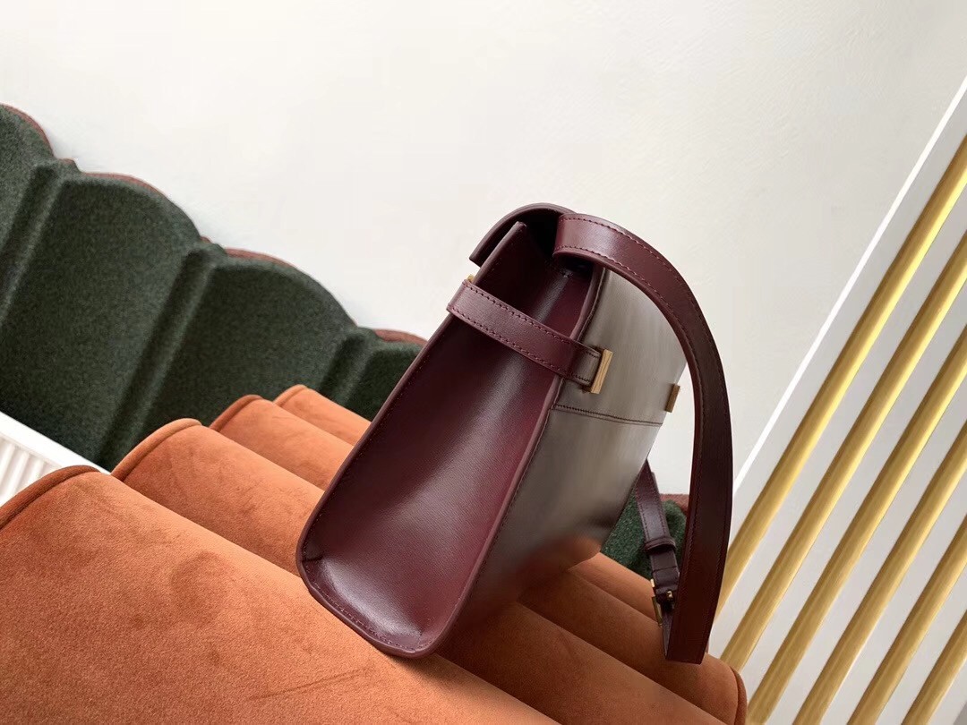 Sa**t Lau*nt manhattan baguette bag in bordeaux calfskin