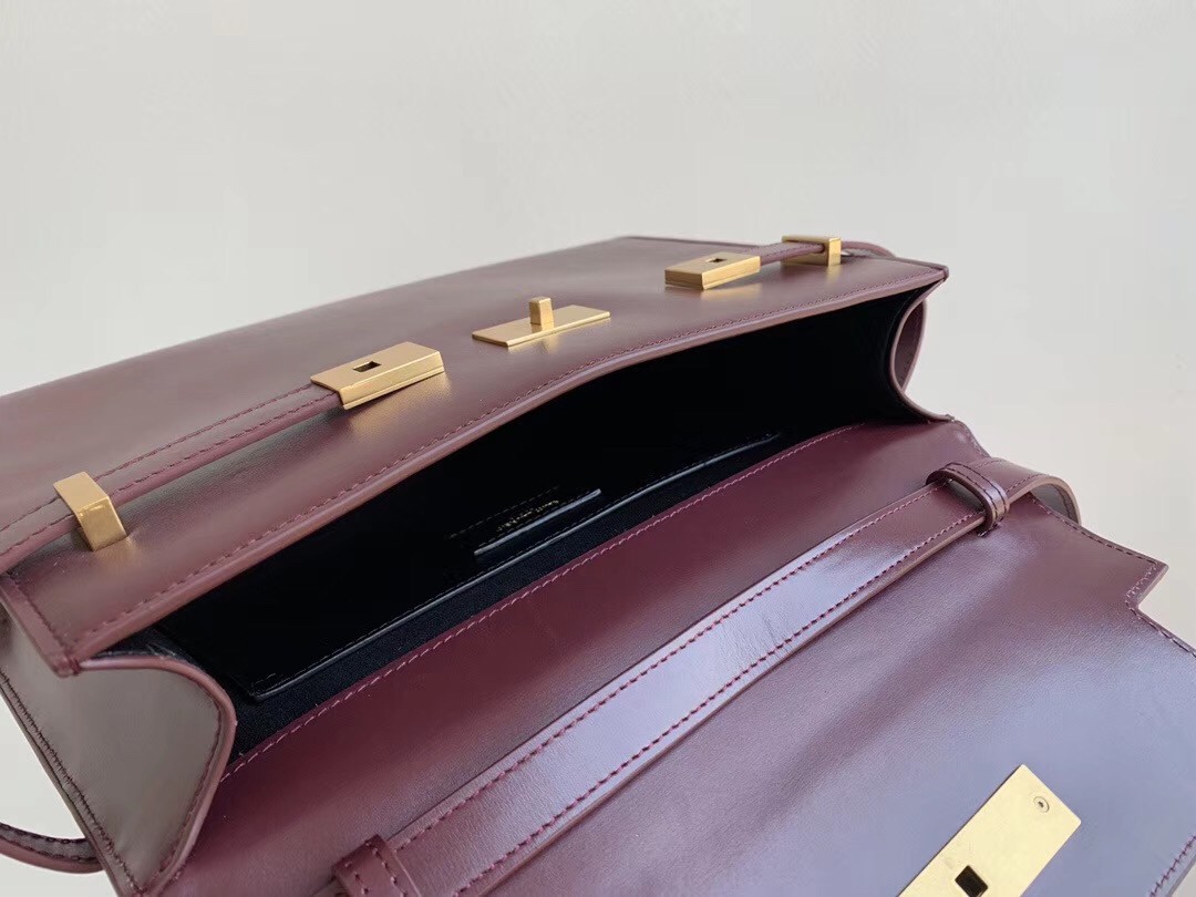 Sa**t Lau*nt manhattan baguette bag in bordeaux calfskin