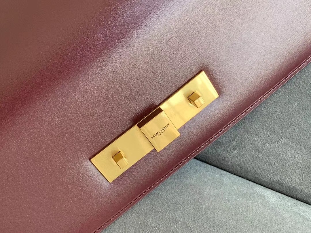 Sa**t Lau*nt manhattan baguette bag in bordeaux calfskin