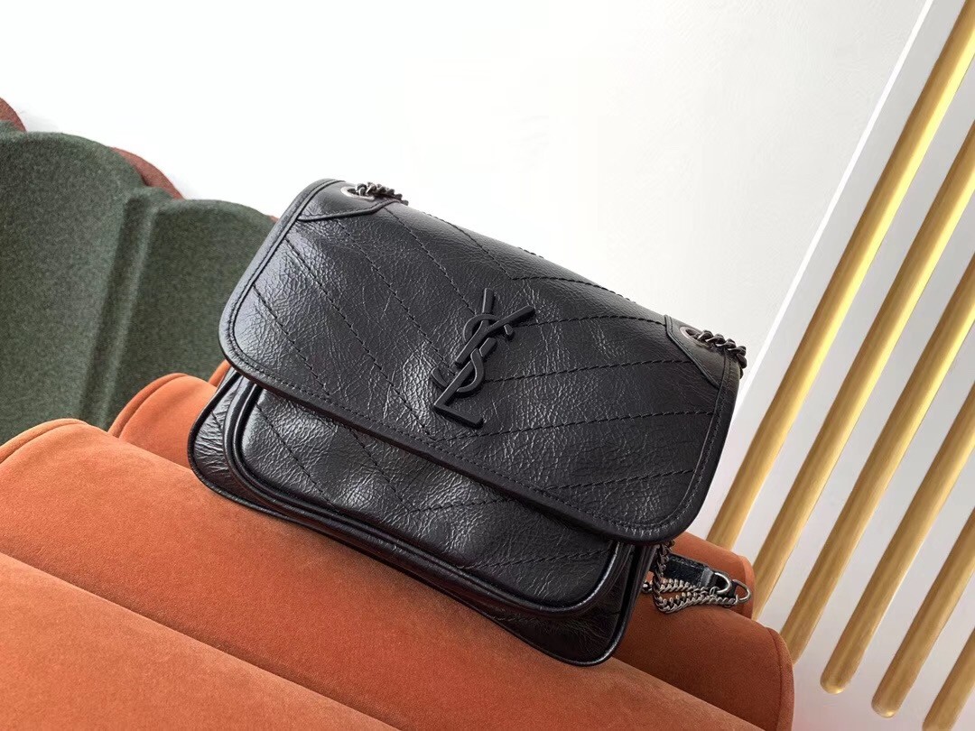Sa**t Lau*nt baby niki chain bag in black crinkled leather