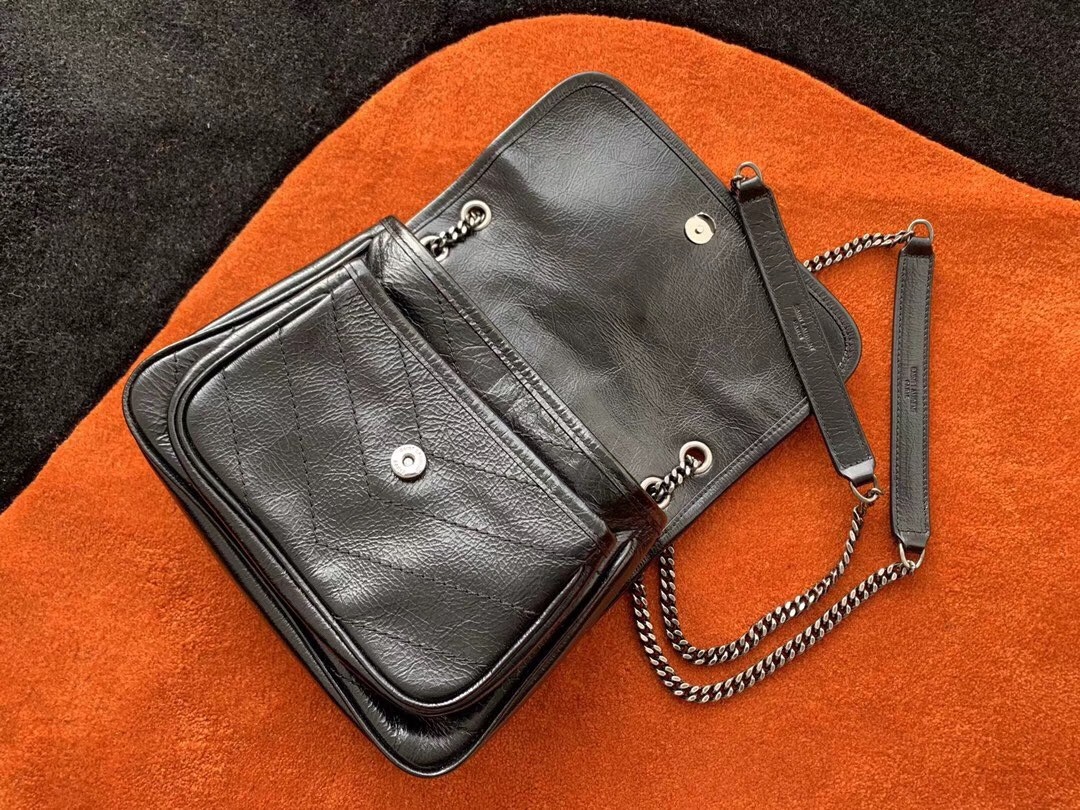 Sa**t Lau*nt baby niki chain bag in black crinkled leather