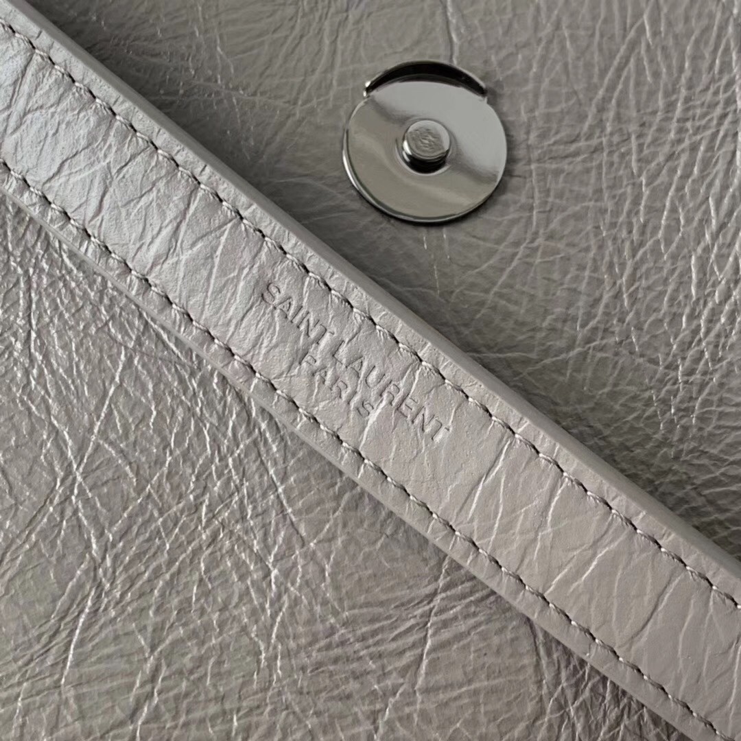 Sa**t Lau*nt medium niki bag in grey crinkled leather