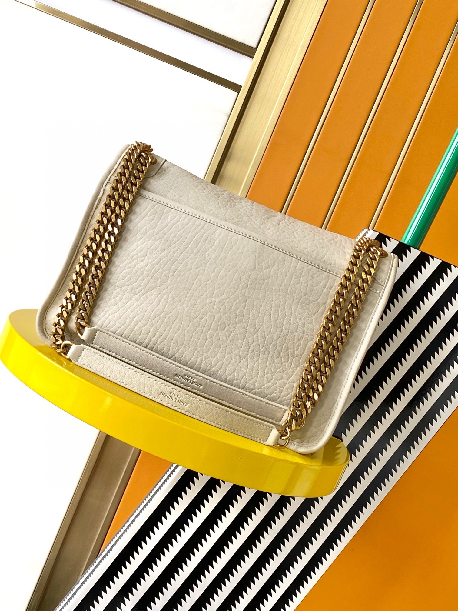Sa**t Lau*nt niki medium chain bag in white grained lambskin