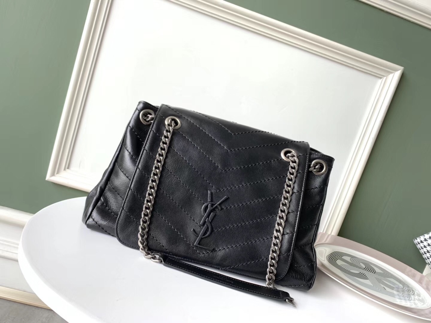 Sa**t Lau*nt nolita medium bag in black quilted leather
