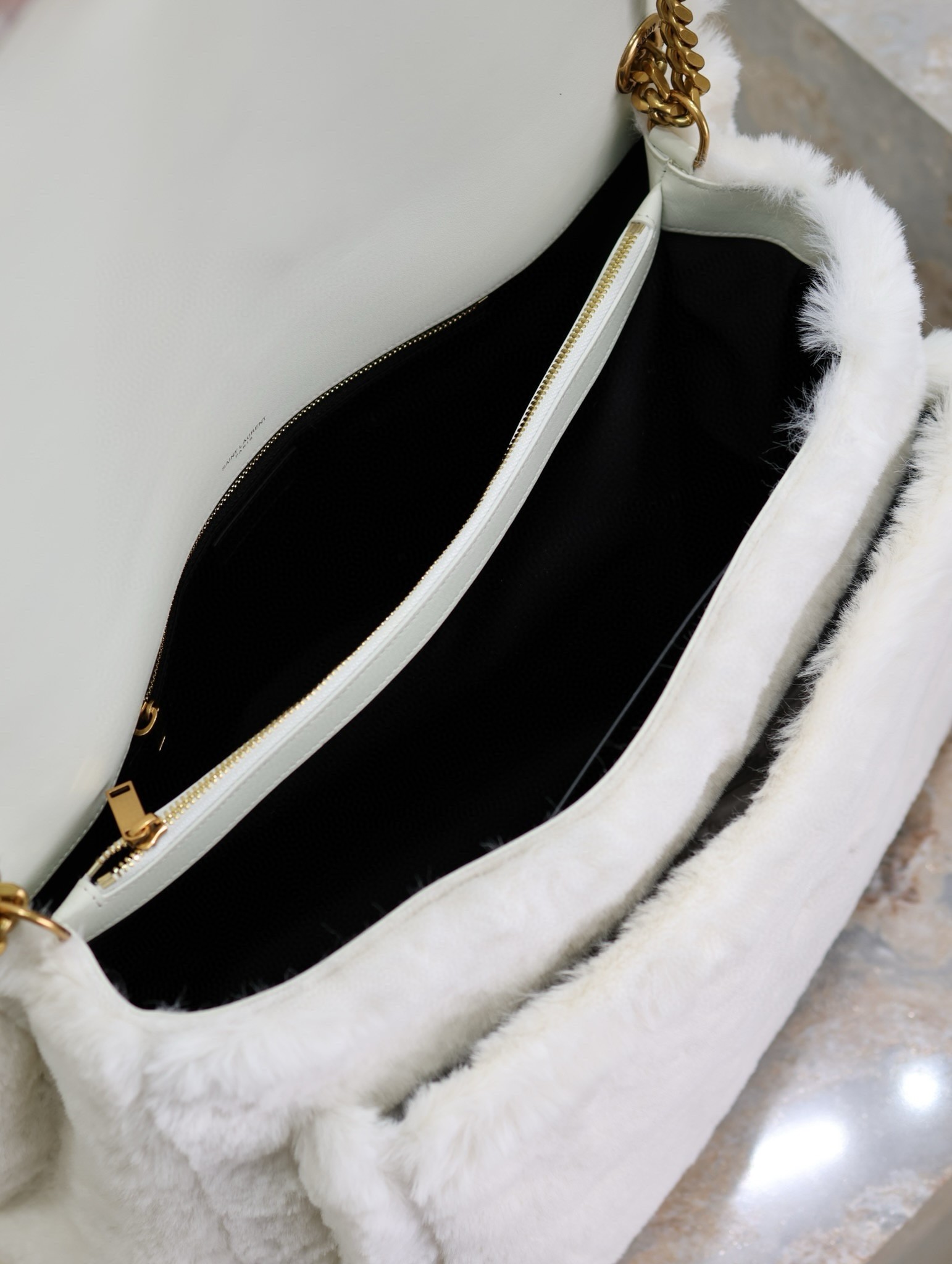 Sa**t Lau*nt niki oversized shoulder bag in white shearling