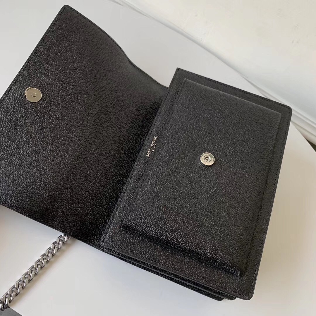 Sa**t Lau*nt sunset medium bag in black grained leather