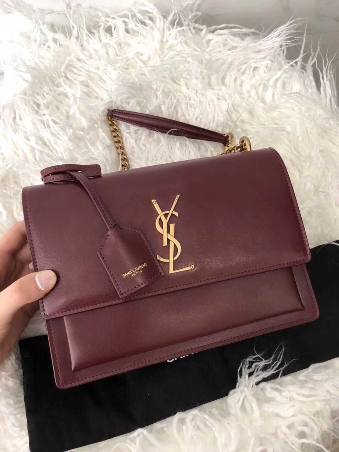 Sa**t Lau*nt sunset medium bag in bordeaxu calfskin