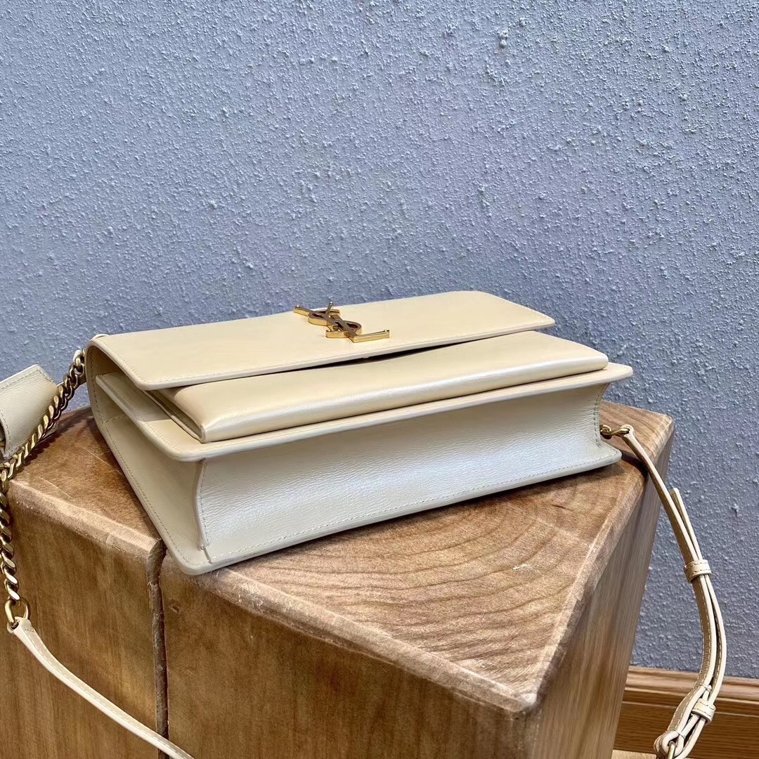 Sa**t Lau*nt new medium sunset bag in beige calfskin
