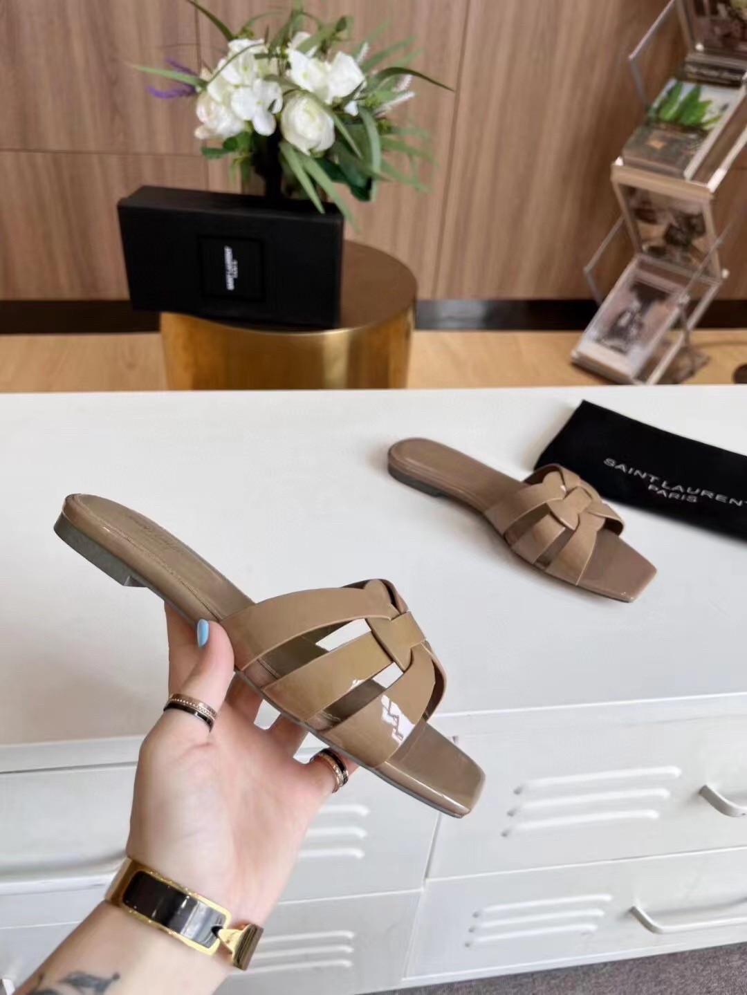 Sa**t Lau*nt tribute slides in dark beige patent leather