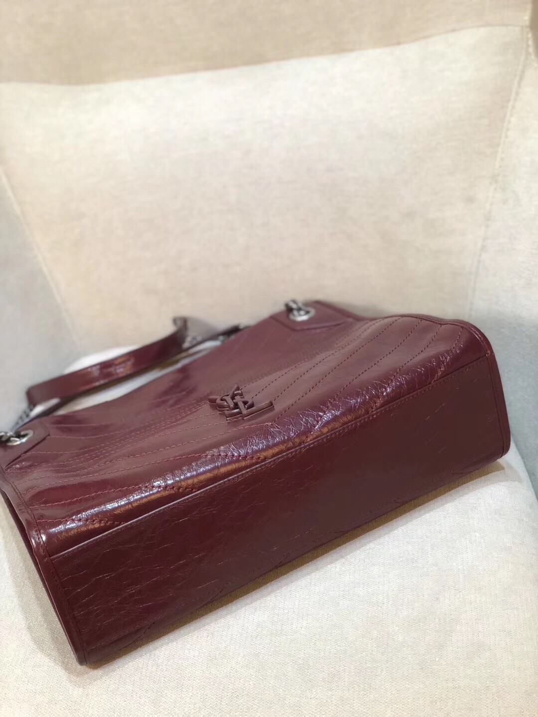 Sa**t Lau*nt medium niki shopping bag in bordeaux leather