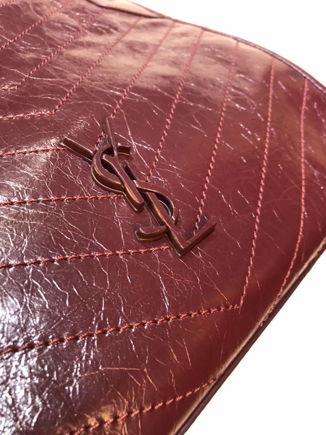 Sa**t Lau*nt medium niki shopping bag in bordeaux leather