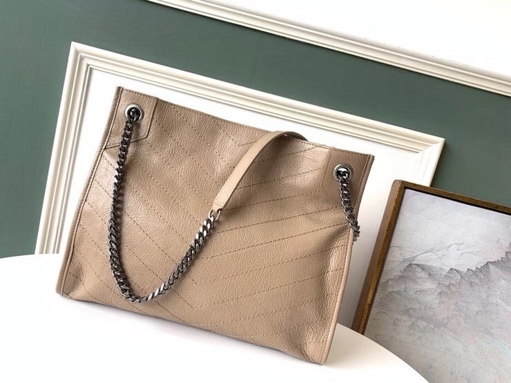 Sa**t Lau*nt medium niki shopping bag in sand leather