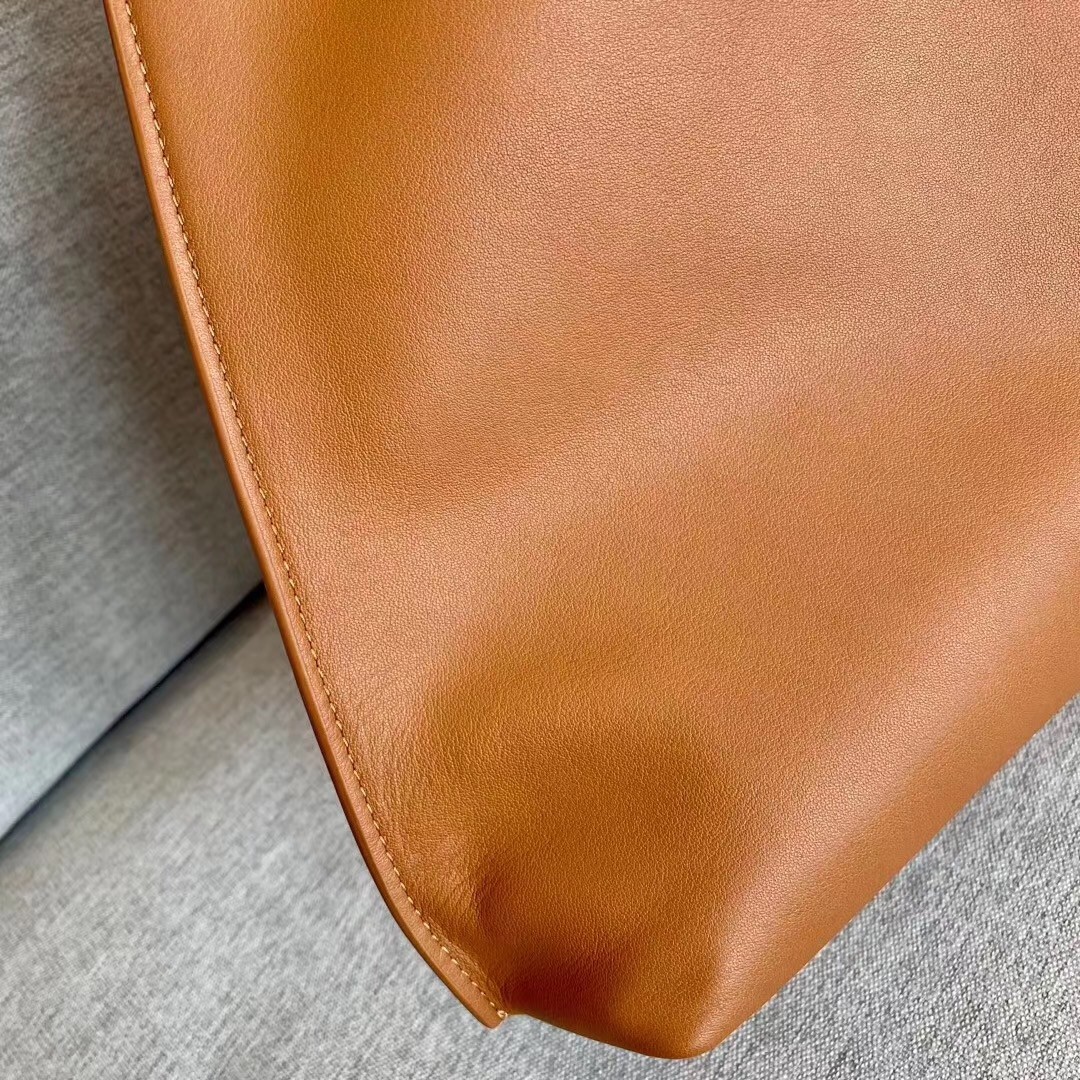 Sa**t Lau*nt tag hobo bag in brown calfskin