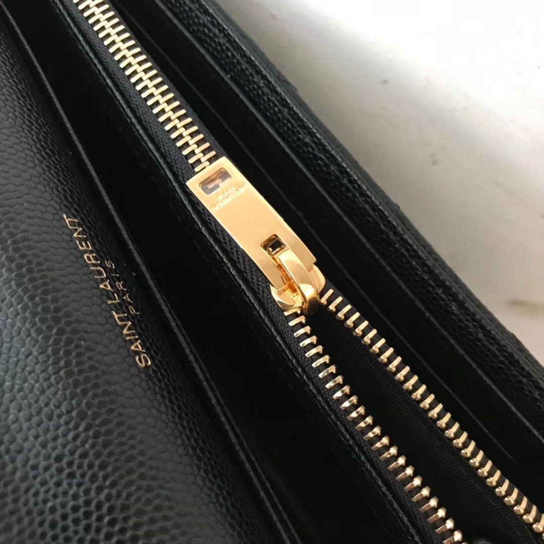Sa**t Lau*nt large monogram flap wallet in black grained leather